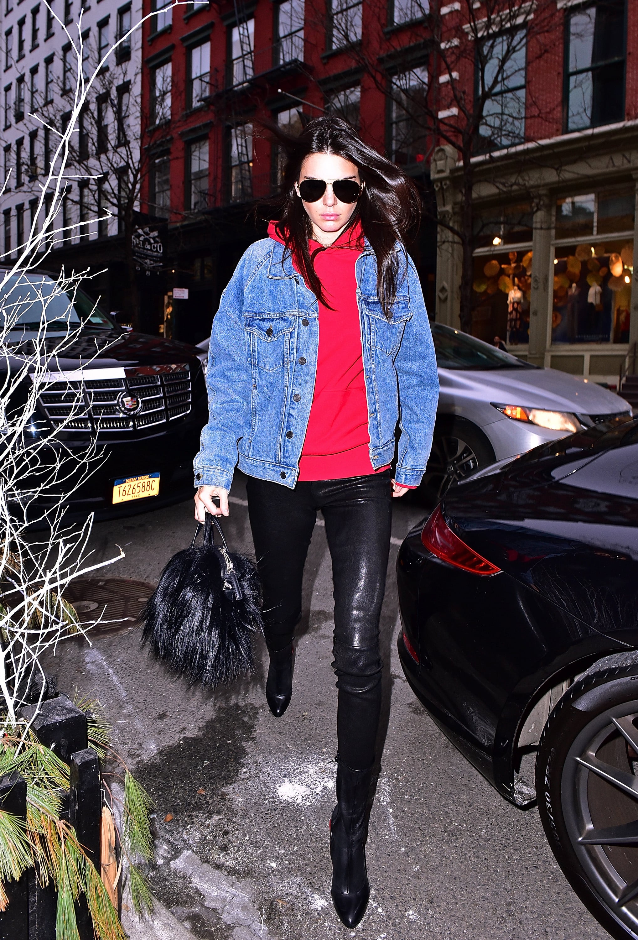 This Denim Jacket, Red Hoodie, and Leather Leggings Combo Was Perfect For a  Friday | Every Killer Outfit Kendall Jenner Wore This Fashion Month |  POPSUGAR Fashion Photo 45