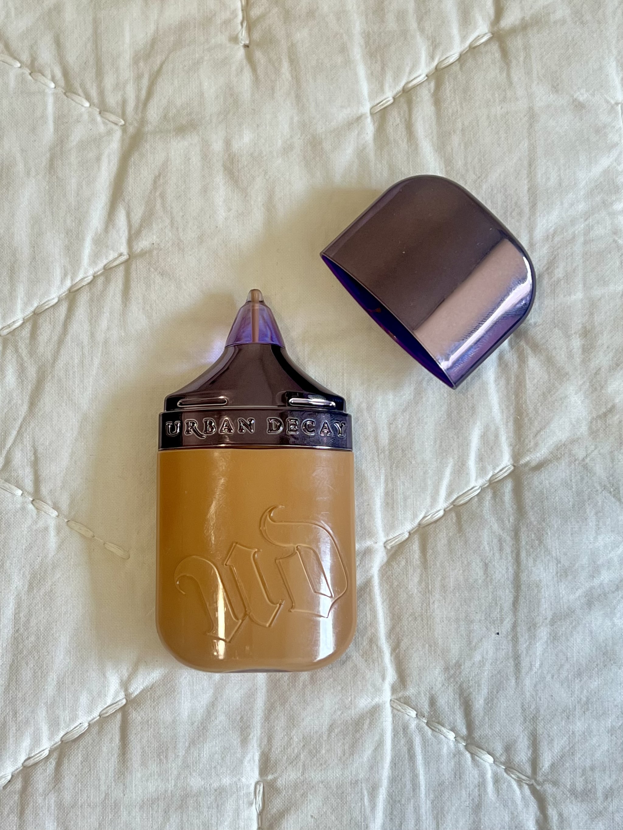 The Urban Decay Face Bond Foundation with cap off.