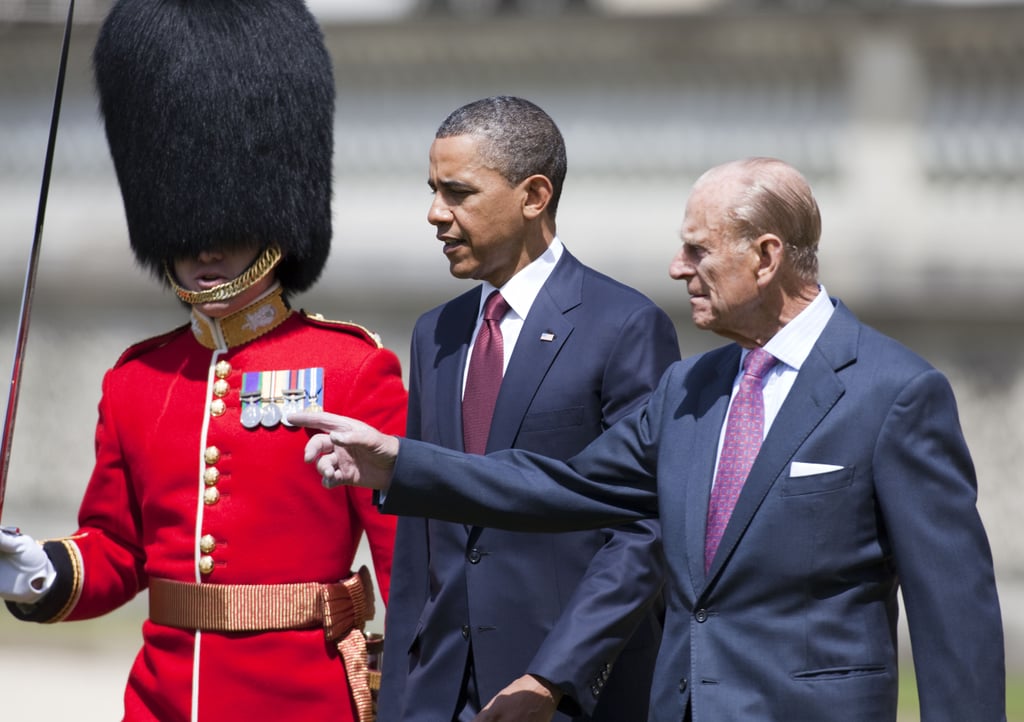 Former President Barack Obama has just an inch on the prince, but appears even taller.