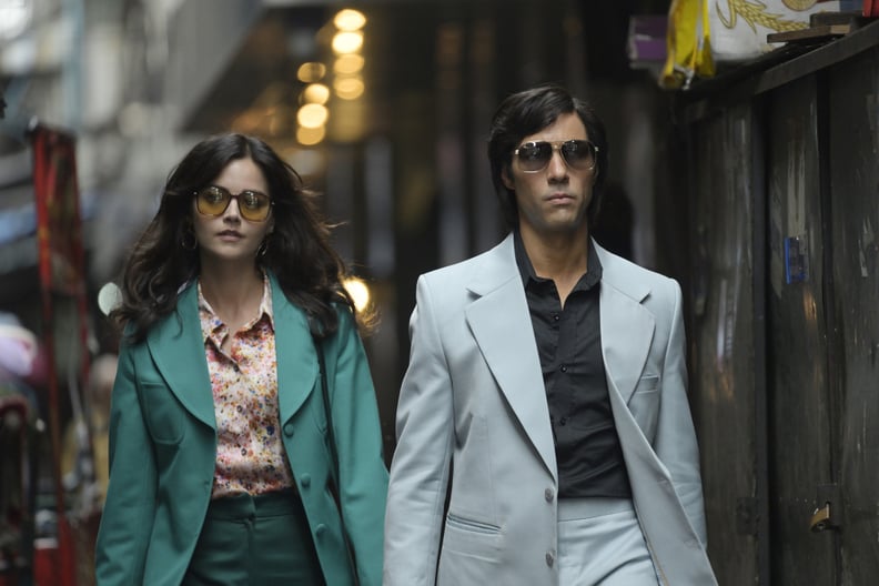 Viridian Green Suit, Speckled Orange Blouse, and Oversize Sunglasses