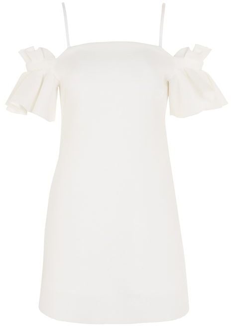 Summers are for LWD (aka little white dresses) like this Topshop Structured Frill Dress ($130).