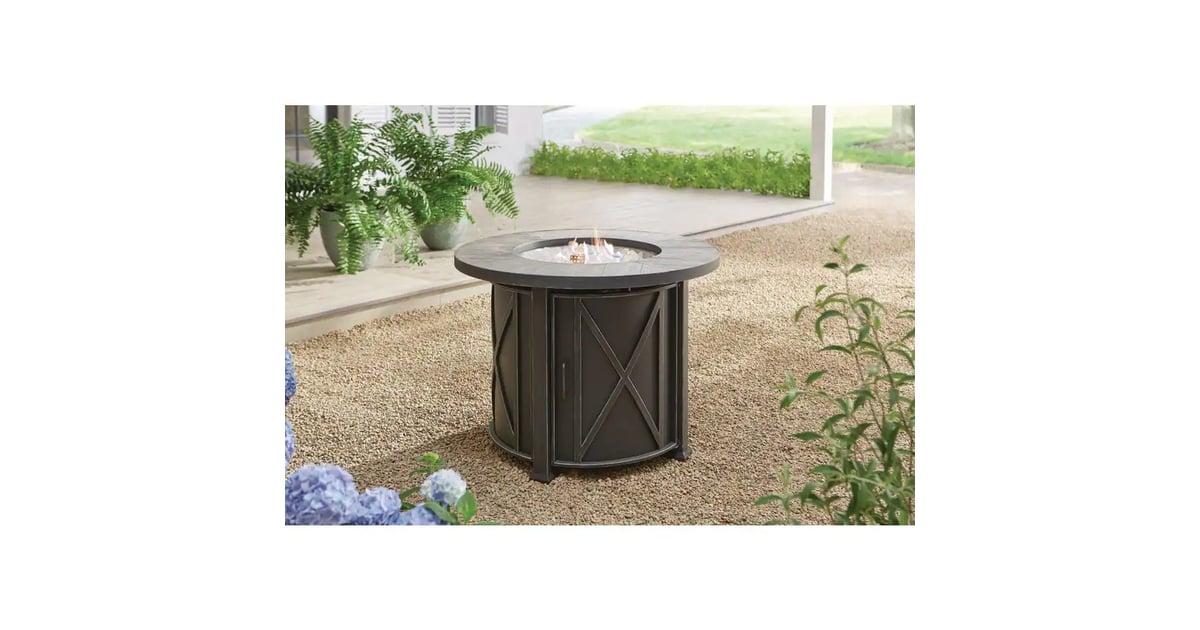 A Round Table Hampton Bay Park Canyon 35 in. Round Steel Propane Fire