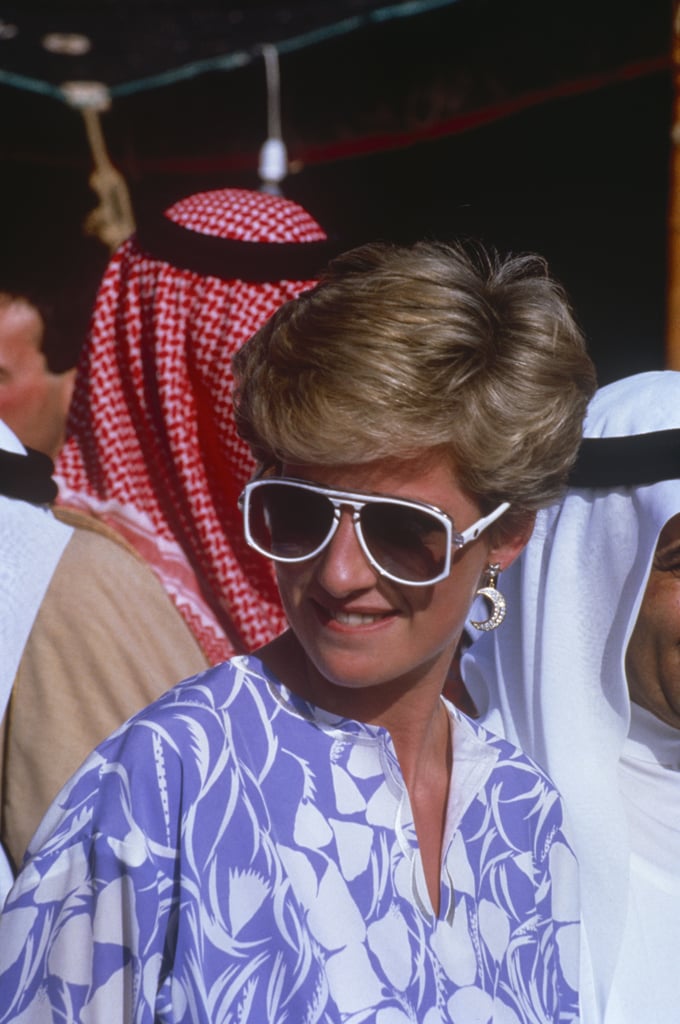 Wearing the white-framed aviators, Diana chose a Catherine Walker printed outfit along with a moon earring while in Riyadh, Saudi Arabia.