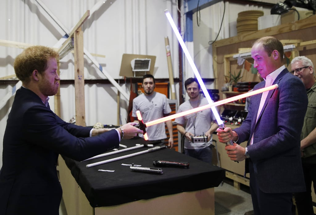 Harry and William dueled each other with lightsabers while visiting the Star Wars set at England's Pinewood Studios in April.
