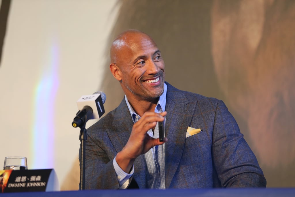 Dwayne "The Rock" Johnson's pearly whites came out at a press event for his movie Hercules in Beijing on Thursday.