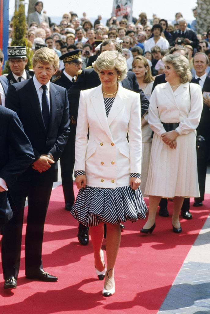 For her first appearance on the Cannes Film Festival red carpet, Diana wore a puffy Catherine Walker dress with a double-breasted white blazer.