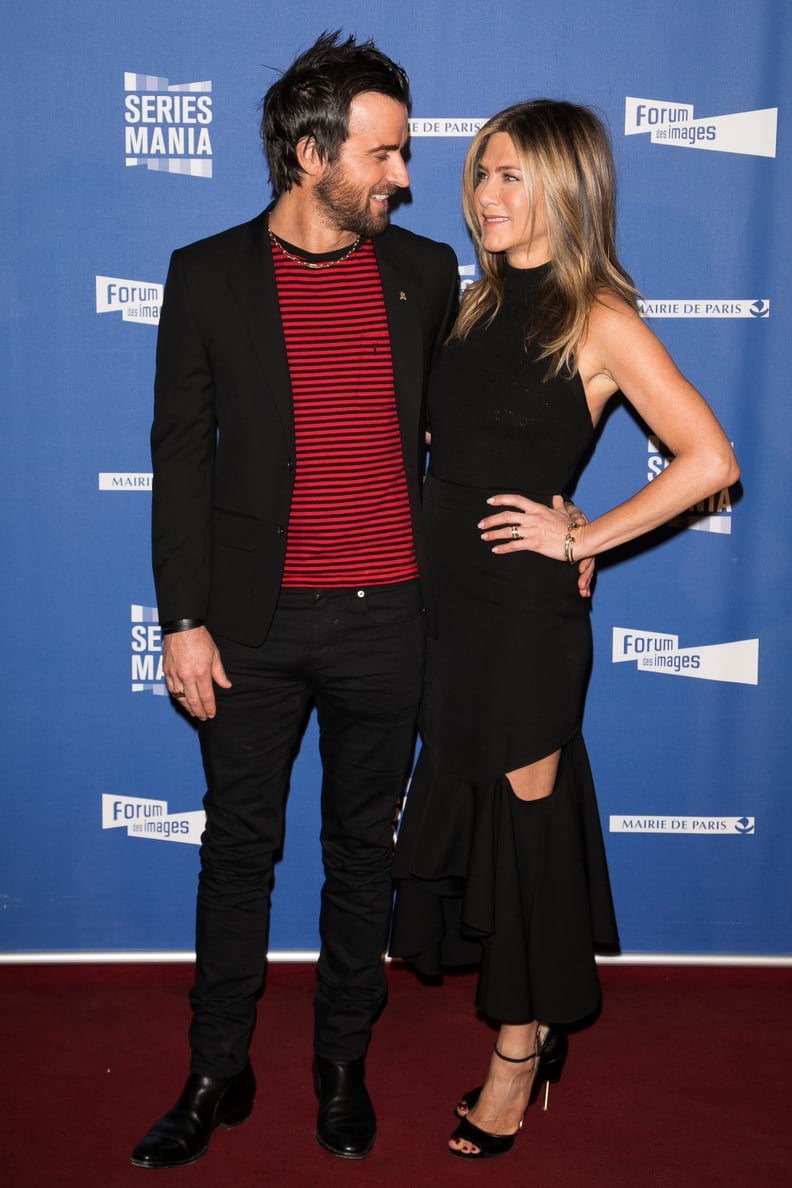 Jennifer Aniston With Husband Justin Theroux Wearing a Black Givenchy Dress