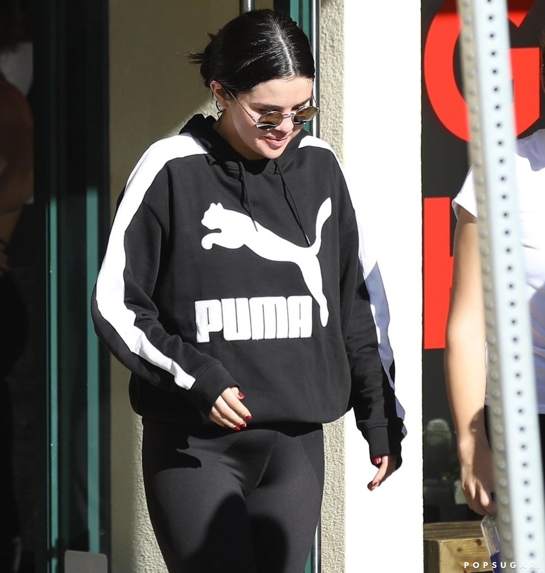 Selena Gomez: White Sweatshirt, PUMA Leggings
