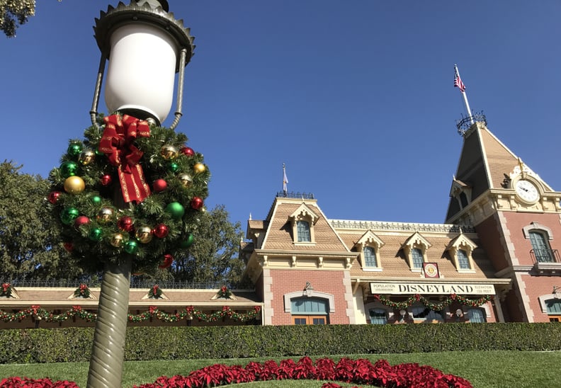 Guests Are Greeted at the Disneyland Main Street Train Station With Cheerful Seasonal Decorations.