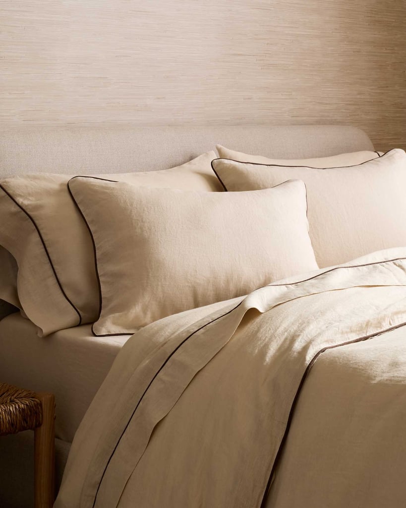 Quince European Linen Piped Deluxe Bedding Bundle ($250)
My mom is obsessed with bedding, and she's always swapping things out for fun, cute, cozy fabrics. Quince's bedding is perfect because it's gorgeous, great quality, and it's affordable. I got her an entire bedding bundle for $250, and it includes everything she needs: a duvet cover, shams, and even sheets. I can already tell I'm going to want the same set for myself.