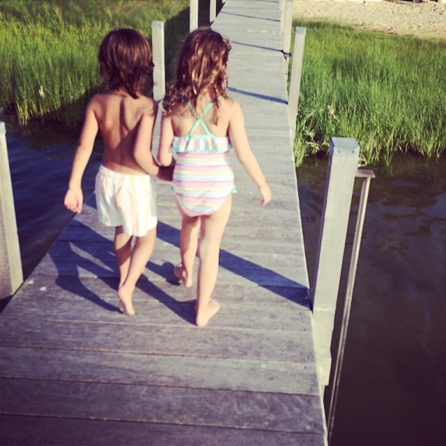 Mason Disick walked hand in hand with a friend on a dock in the Hamptons.
Source: Instagram user kourtneykardash