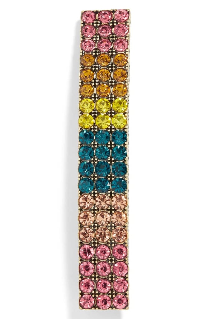Barrettes are back! Shows like Tibi sent models wearing barrettes down the runway, and many street style stars are using flashy designer barrettes or plain bobby pins to sweep back one side of their hair at the temple. Get in on the look with this fun barrette ($38) that features colorful crystals.