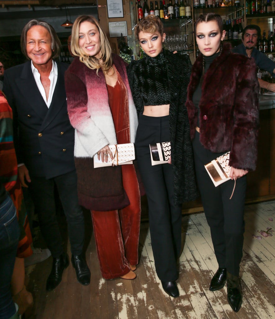 Gigi and Bella posed alongside their father, Mohamed, and their sister Alana, who launched her own accessory collaboration with Lou & Grey.