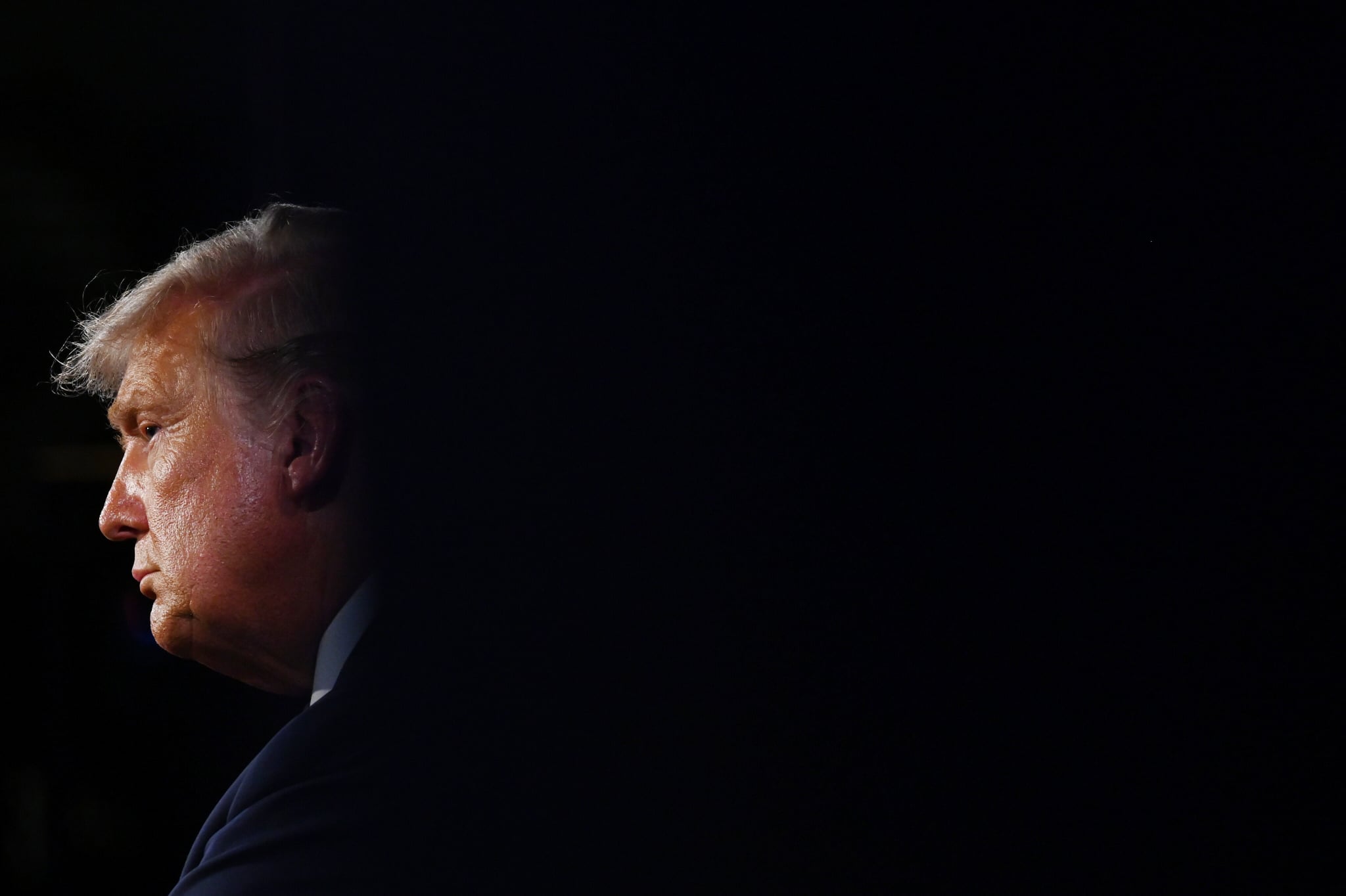 CLEVELAND, OHIO - SEPTEMBER 29: U.S. President Donald Trump listens during the first presidential debate against former Vice President and Democratic presidential nominee Joe Biden at the Health Education Campus of Case Western Reserve University on September 29, 2020 in Cleveland, Ohio. This is the first of three planned debates between the two candidates in the lead up to the election on November 3. (Photo by Olivier Douliery-Pool/Getty Images)