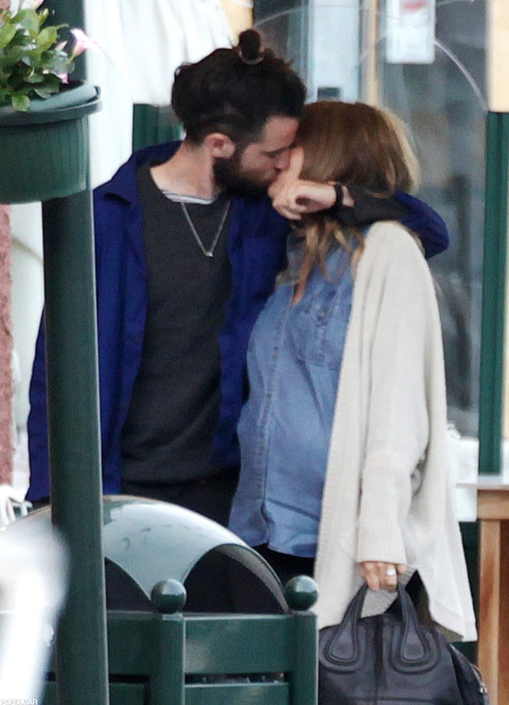 Tom Sturridge and Sienna Miller shared a passionate kiss on a May 2012 getaway to Portofino, Italy.