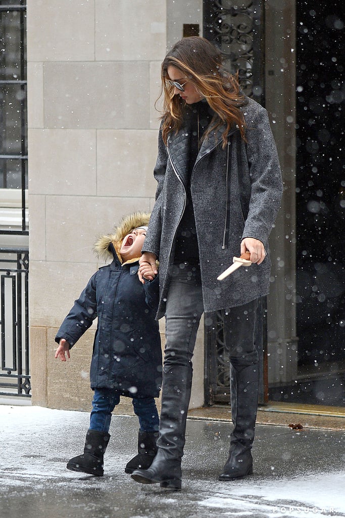 Flynn Bloom tried his best to catch a snowflake with his tongue while taking a walk with mom Miranda Kerr in NYC in December 2013.