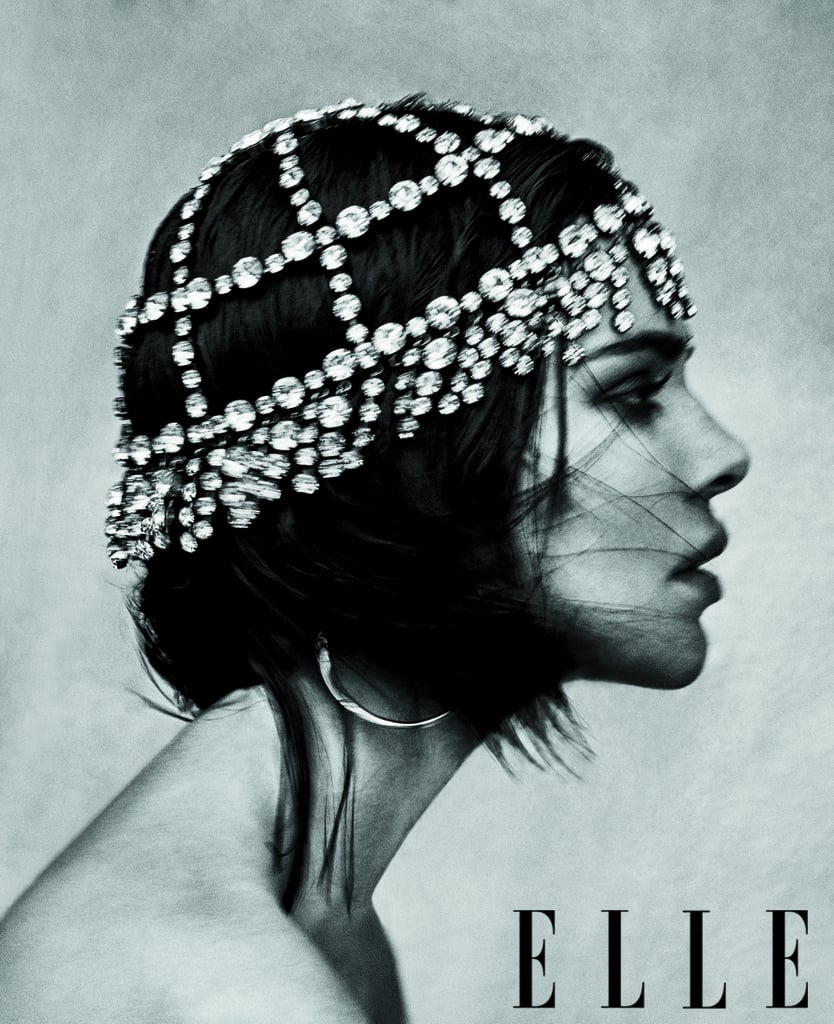 Kendall is wearing a headpiece and earrings by Gucci.