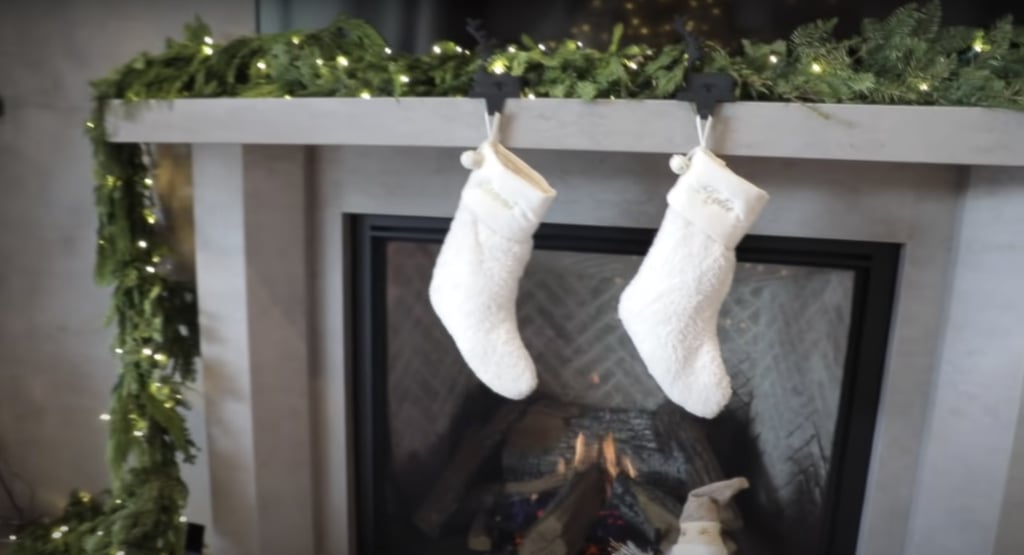 Kylie's and Stormi's Stockings Hang in Front of the Fireplace