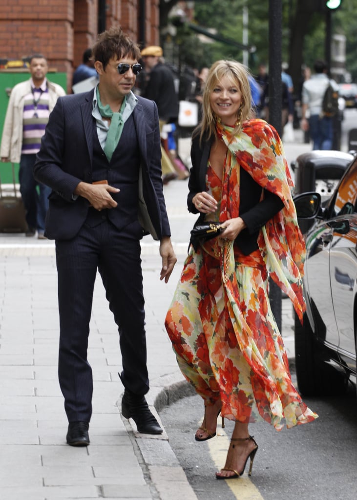 Kate Moss ditched her skinny denim in lieu of a floral maxi dress for a wedding she and husband Jamie Hince attended in London in June. Clearly she can pull off both! To stand out à la Kate, just find a fresh floral dress in punchy hues, and add a black blazer to temper it.