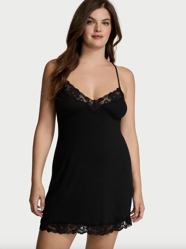 Victoria's Secret Ribbed Modal & Lace Cross-Back Slip Dress ($30, originally $60)
Between the subtle V-neckline and dainty lace trim, there's so much to love about this dress. It includes triangle cups that form a flattering plunging neckline and an open-back design for that sultry vibe.