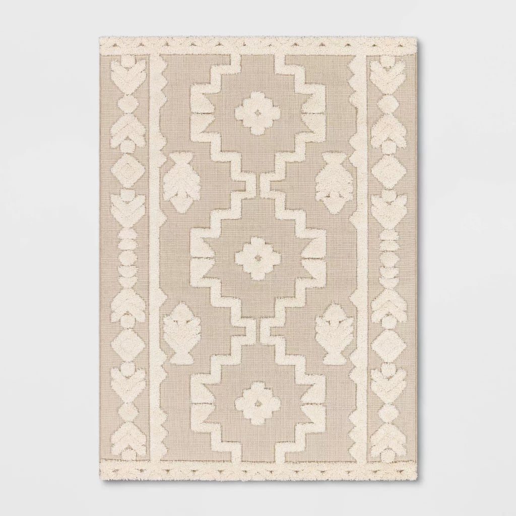 For Subtle Style: Tufted Outdoor Rug
