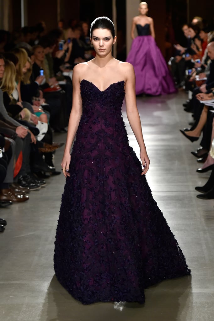 She Glided Gracefully Down the Oscar de la Renta Runway in a Deep Plum Gown She Glided Gracefully Down the Oscar de la Renta Runway in a Deep Plum Gown