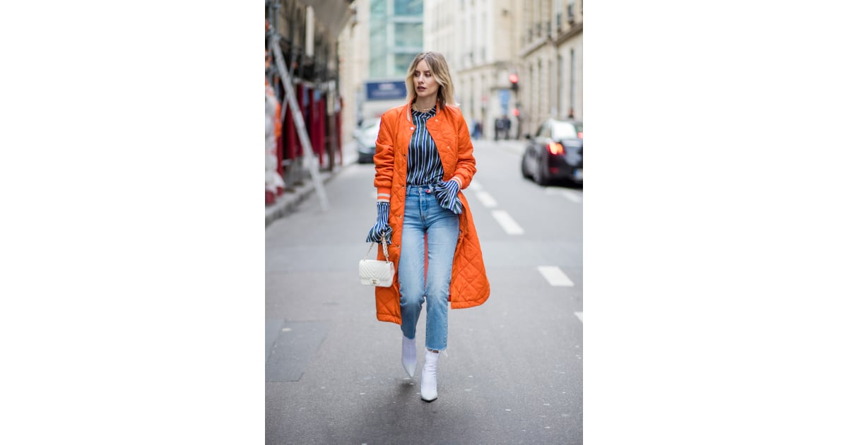 Pair White Boots With Mom Jeans and a Bright Orange Coat How to Style