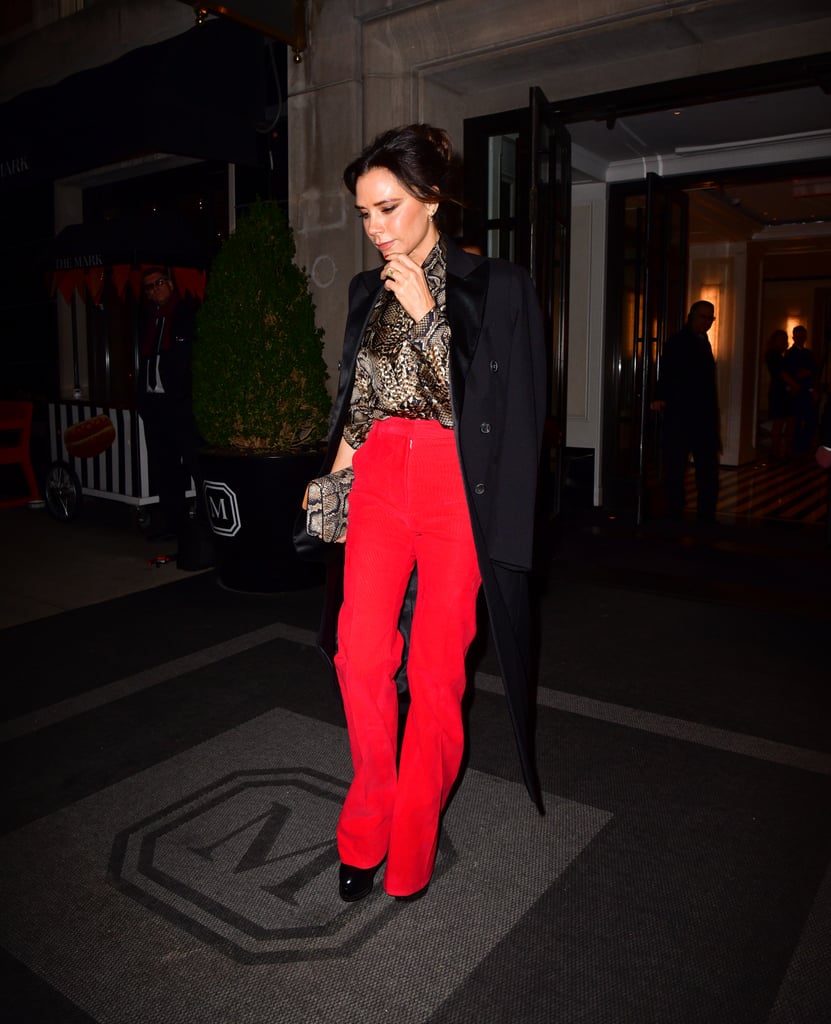 Victoria Beckham Red Pants and Snakeskin Blouse January 2019