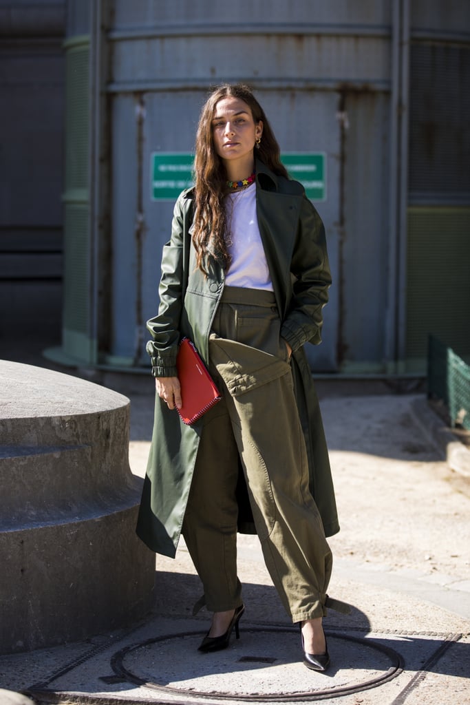 Take the utilitarian trend for a spin by pairing a white tee with army-green separates and pumps.