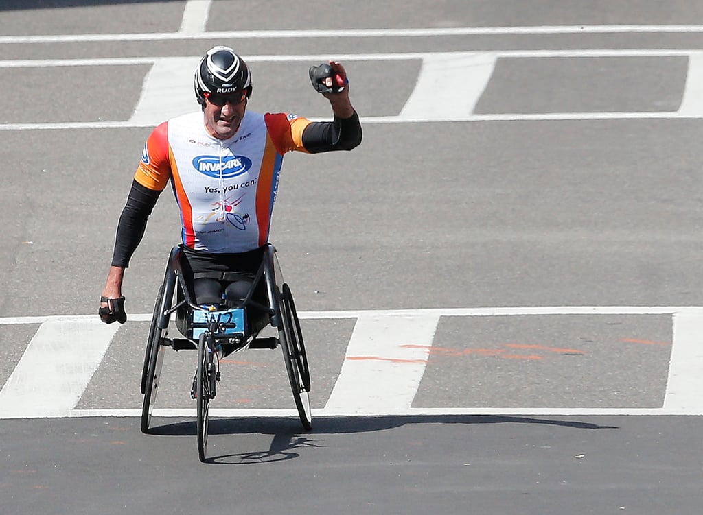 Ernst van Dyk celebrated after winning the men's wheelchair division.
