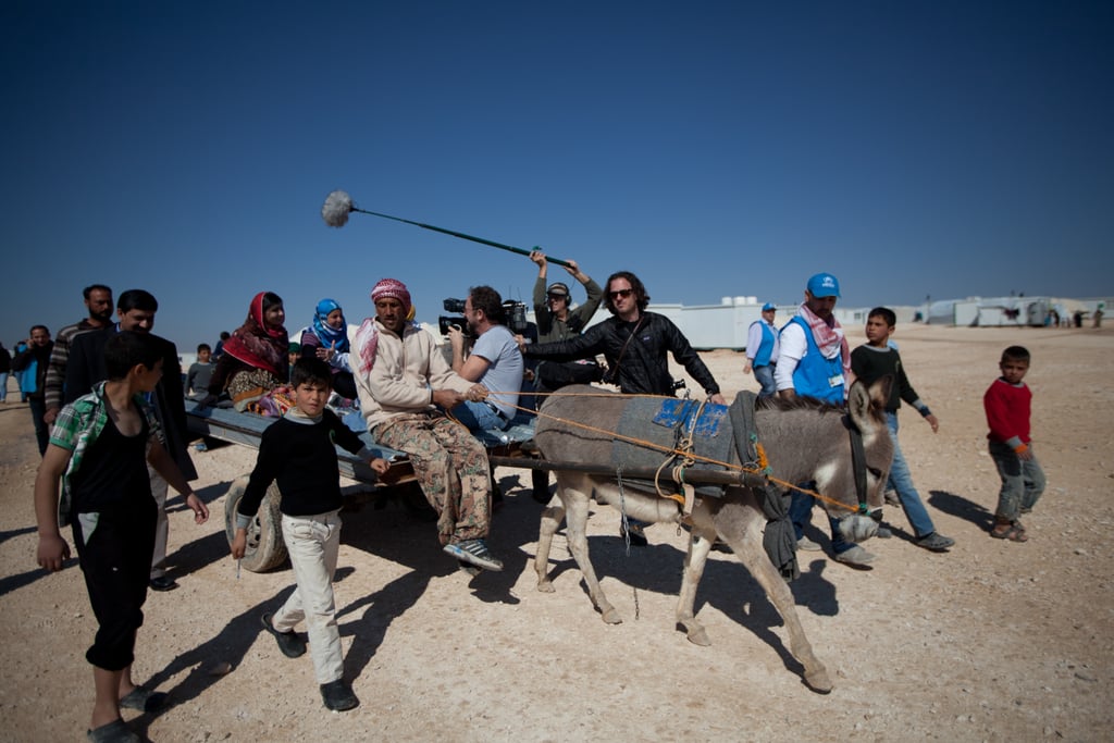 Malala visits the Zaatari refugee camp in Jordan to meet with young Syrian refugees, followed by a camera crew.