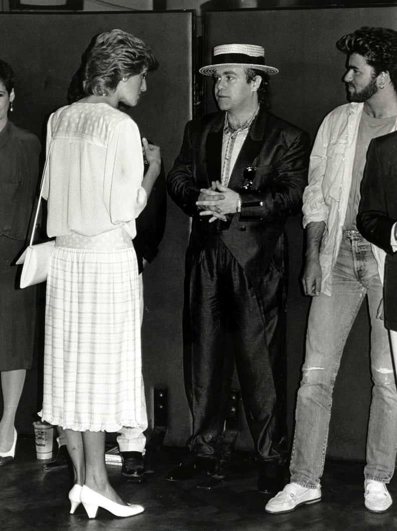 British Royalty, Music, pic: 13th July 1985, Diana, Princess of Wales pictured chatting to musicians Elton John (centre) and George Michael at the 