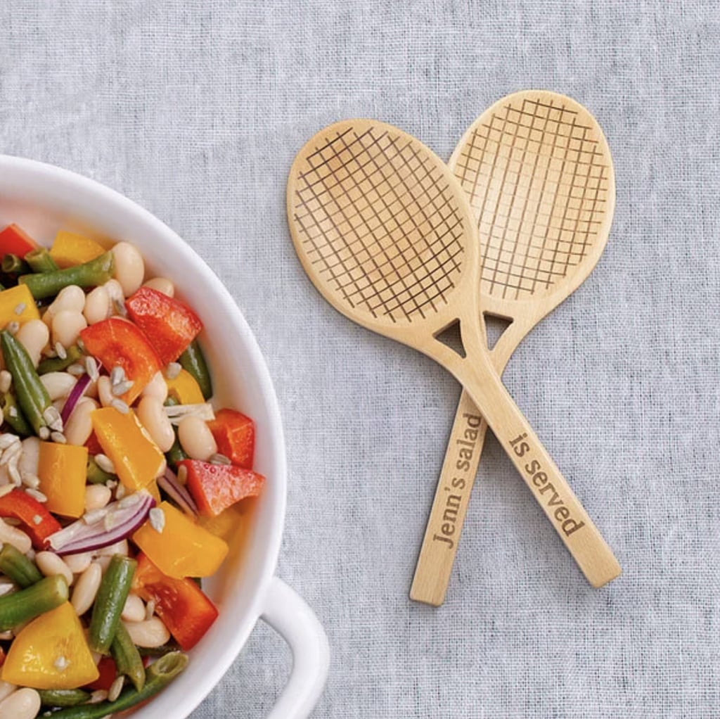 Callie Personalized Tennis Racket Salad Servers ($28, originally $31)
With these tennis racket utensils, you'll be able to serve your guests with ease (literally) and become a champion host in the process. The salad servers can also be customized with special writing at an additional cost.