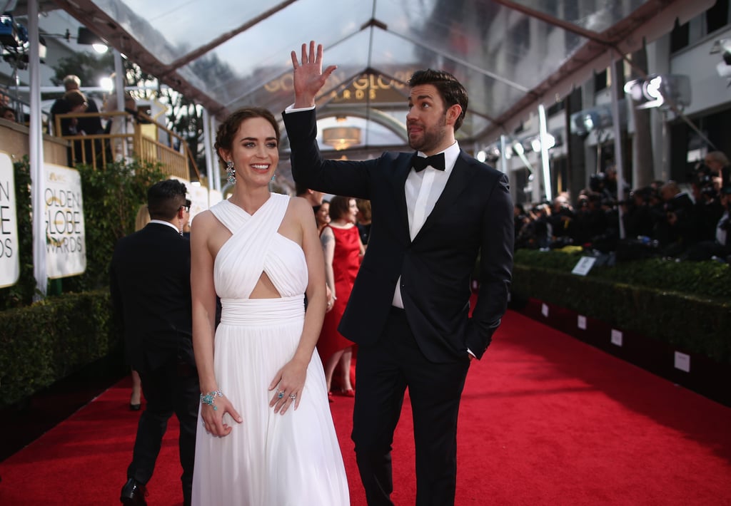 Emily Blunt led the way while John Krasinski waved to fans.