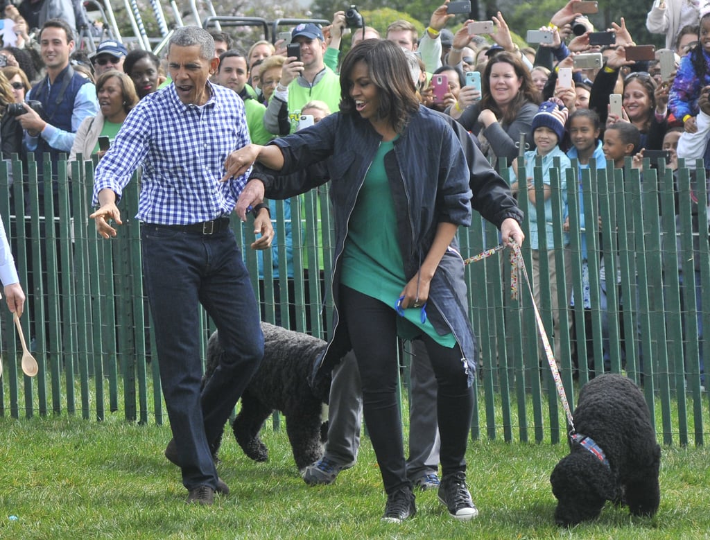Barack got casual too, albeit with a polished button-down and trousers.