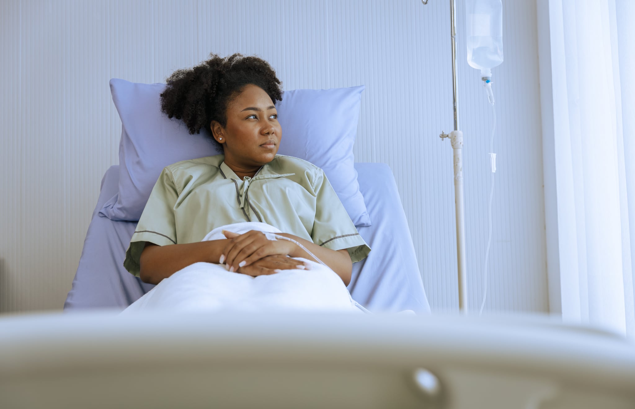 Young woman patient relax or making physical therapy in medical examination room for healthcare and medicine industry concept.