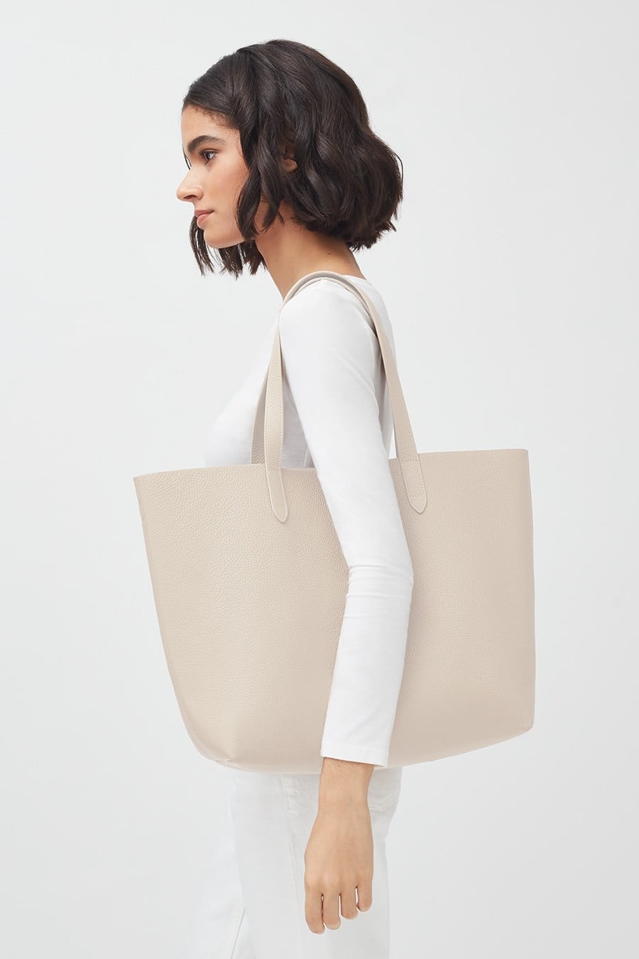 Tall structured store leather zipper tote