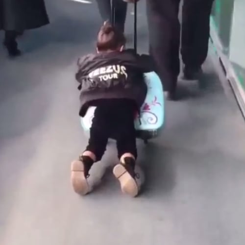 North West Riding on Her Frozen Suitcase Video