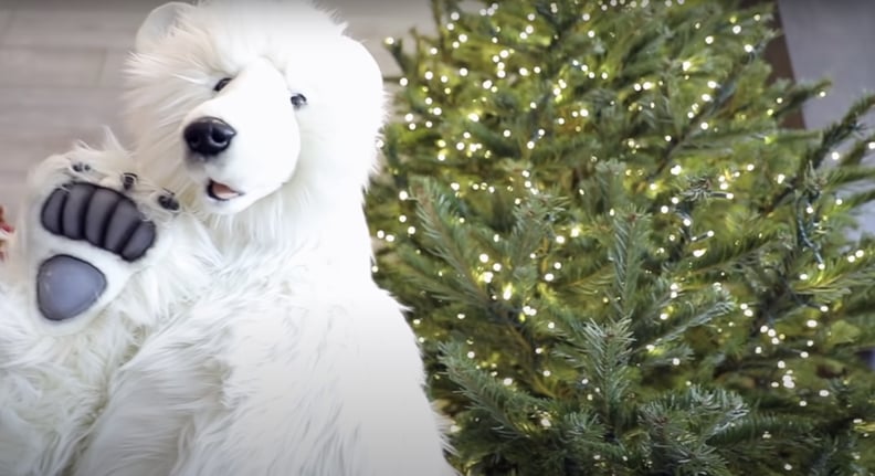 A Very Friendly Polar Bear Is Just *Chilling* in Front of Another Tree in Kylie's Living Room
