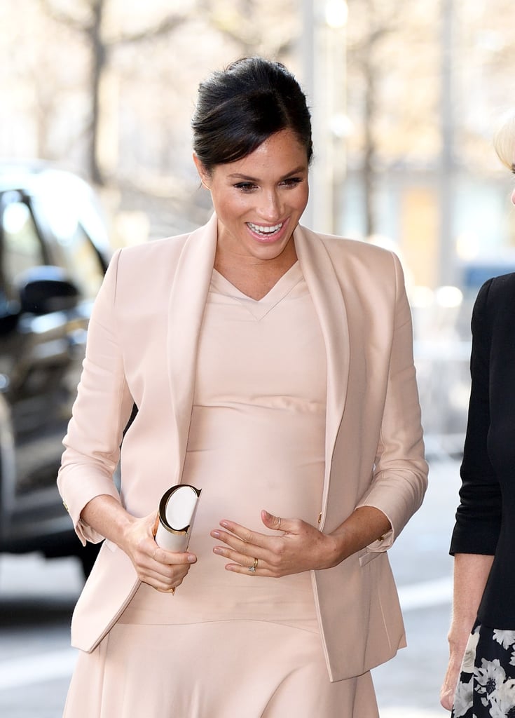 Meghan Markle Touching Baby Bump Pictures