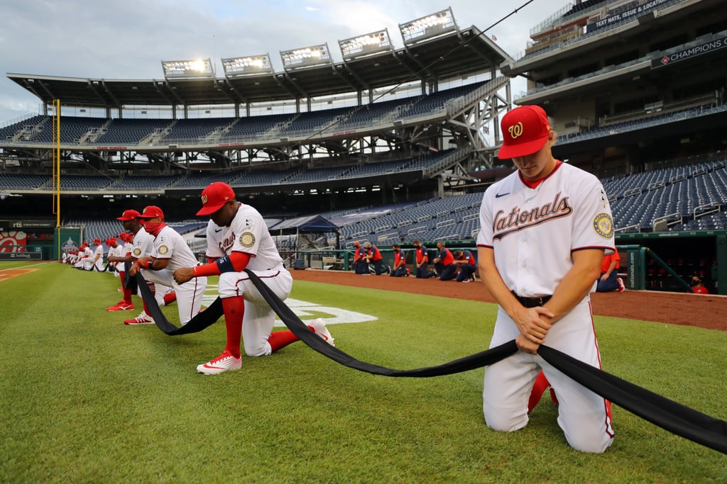 See MLB Players Kneel For Racial Justice on Opening Day