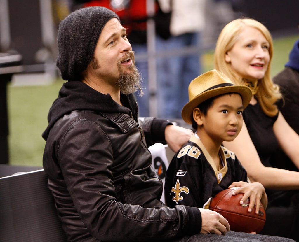 Brad Pitt and his son Maddox Jolie-Pitt took a seat on the bench before  New Orleans Saints playoff game in January 2010.