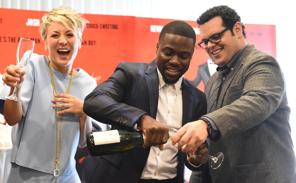 Kaley Cuoco-Sweeting, Kevin Hart, and Josh Gad popped some bubbly at the photocall for their film The Wedding Ringer in LA on Tuesday.