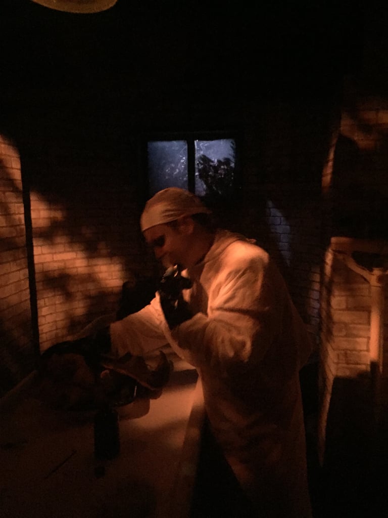 One of the first things you see after stepping over the Murder House threshold and into season one is mad surgeon Dr. Charles Montgomery. In between cutting away at something gruesome on the table, he lashes out at you with his surgical tools. If pressed, I'd give his bedside manner a solid 3/10. 
(Note: his terrifying son Thaddeus, aka Infantata, also jumps out at one point, and it shaved approximately 63 years off my young life.)