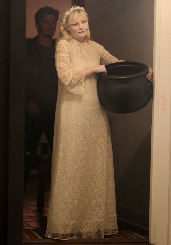 Kirsten Dunst and Garrett Hedlund Handing Out Candy