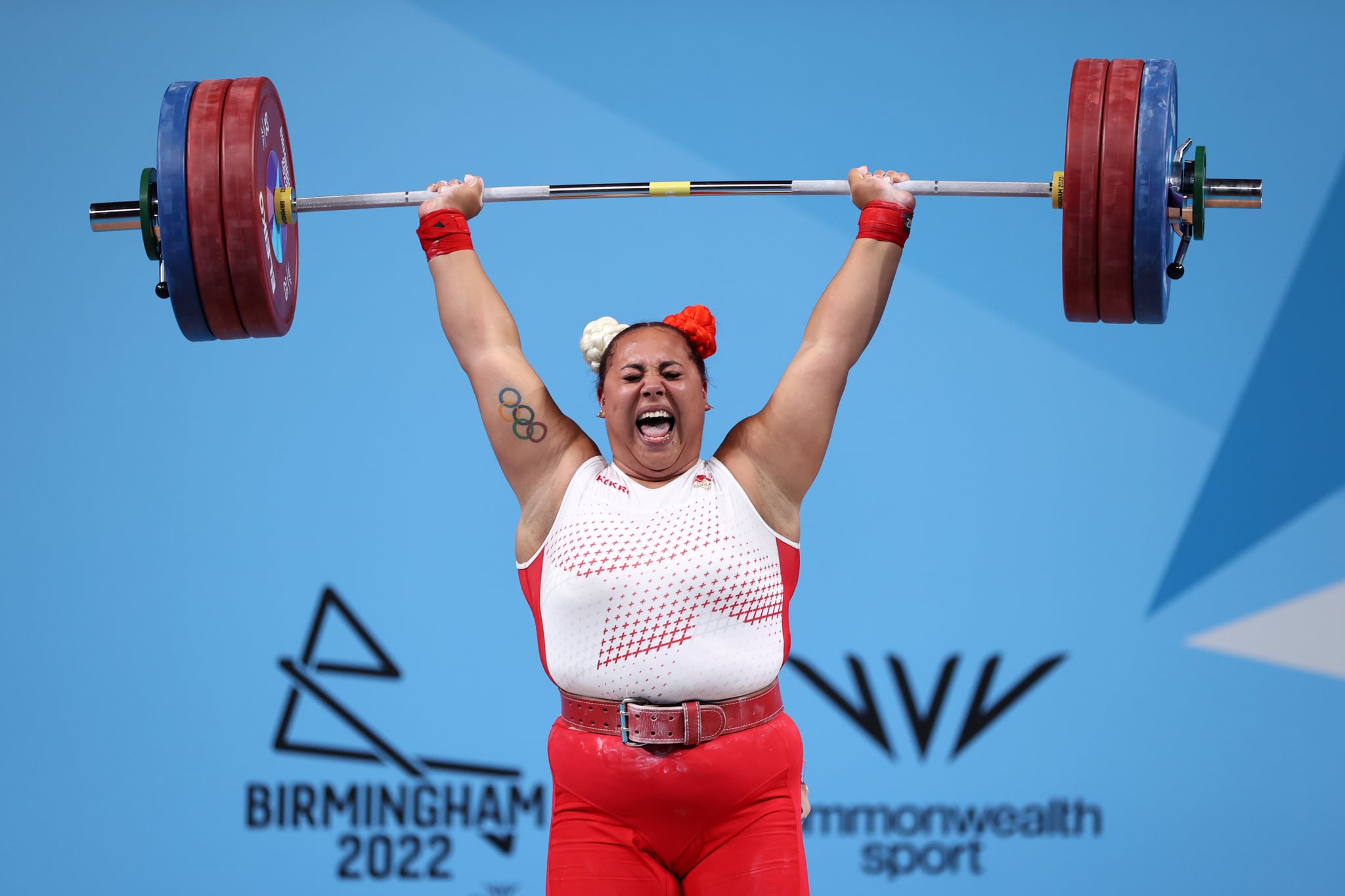 BIRMINGHAM, ENGLAND - AUGUST 03: Emily Campbell of Team England reacts as she performs a clean & jerk during the Women's 87+kg Final on day six of the Birmingham 2022 Commonwealth Games at NEC Arena on August 03, 2022 in Birmingham, England. (Photo by Ryan Pierse/Getty Images)