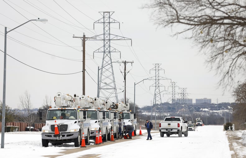 FORT WORTH, TX - FEBRUARY 16: Pike Electric service trucks line up after a snow storm on February 16, 2021 in Fort Worth, Texas. Winter storm Uri has brought historic cold weather and power outages to Texas as storms have swept across 26 states with a mix