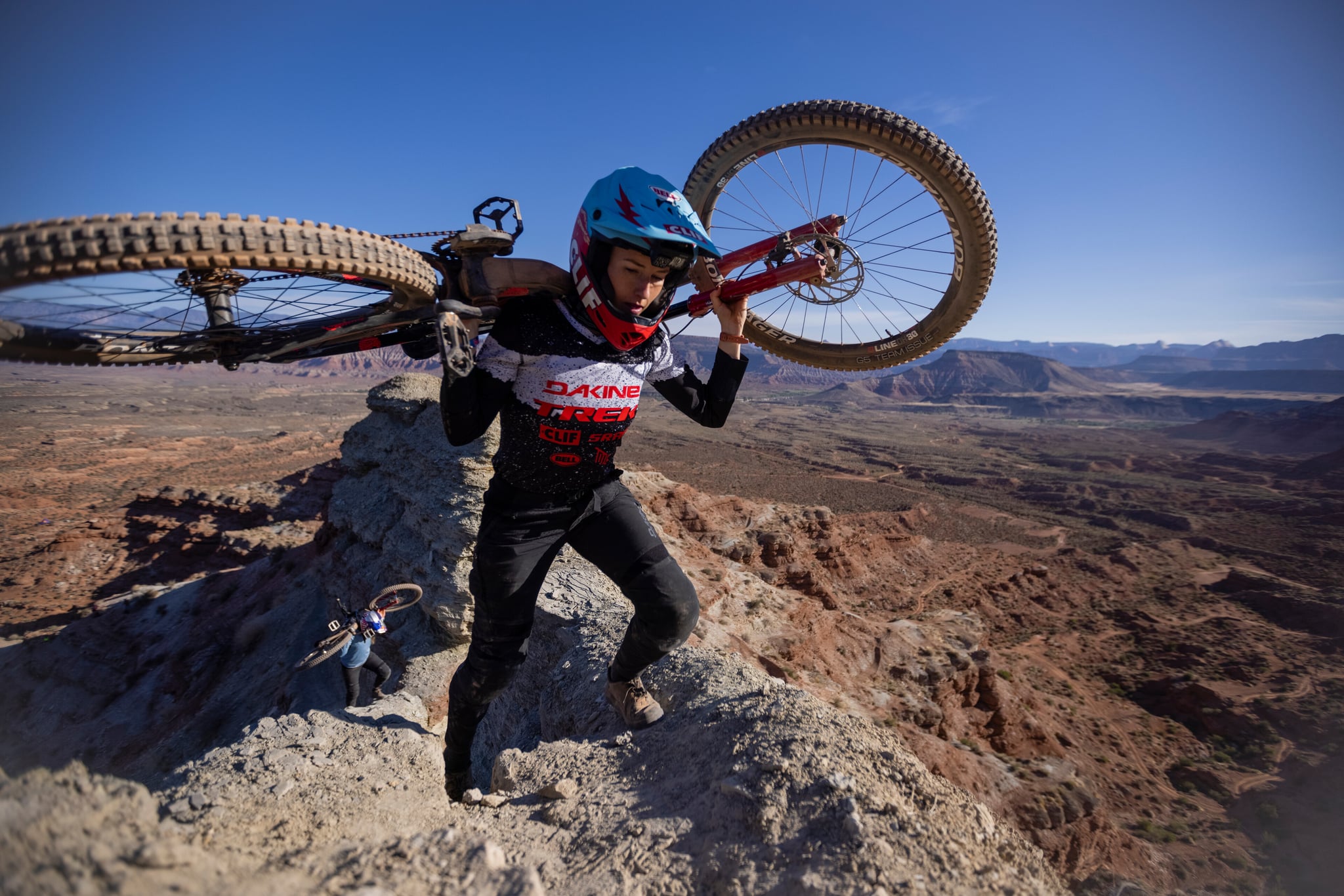 Casey Brown leads Hannah Bergemann up the ridgeline to the top of their line at Red Bull Formation in Virgin, Utah, USA on 30 May, 2021. // Catherine Aeppel / Red Bull Content Pool // SI202105310126 // Usage for editorial use only //