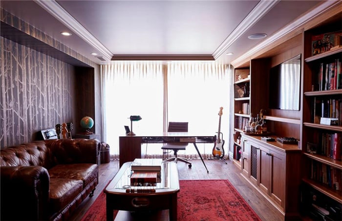Lauren can plan her next entrepreneurial endeavor in this office. We're loving the Anthropologie wallpaper!