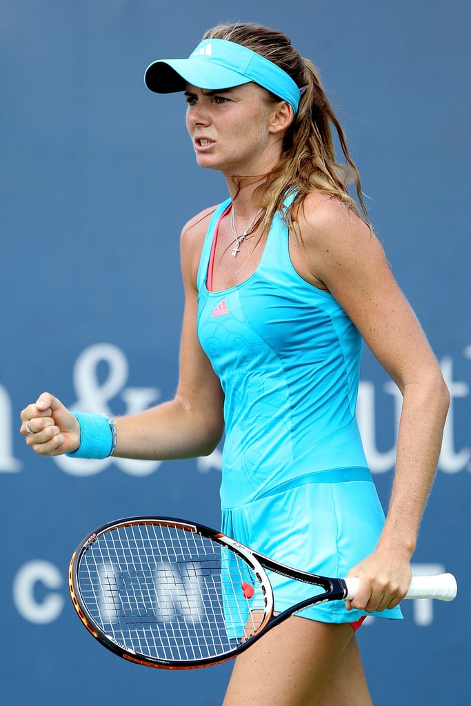 Daniela Hantuchova celebrates match point during the Western & Southern Open in Ohio, August 2011, in head-to-toe turquoise.